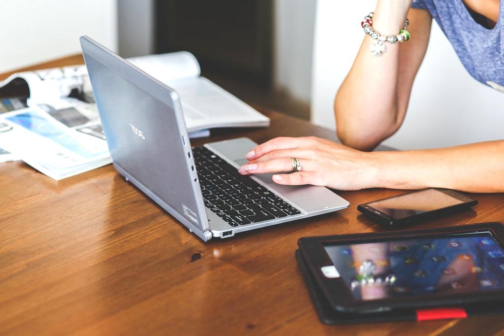 Person using computer with confidence